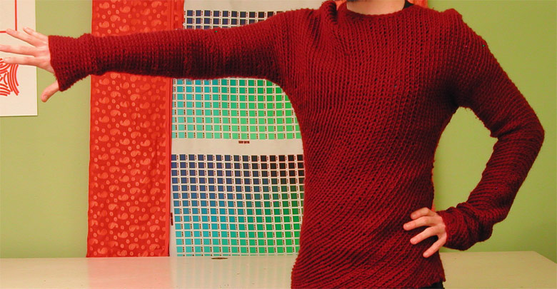 A crochet sweater generated with this application. The pattern starts at the sleeve and radiates ocross the front and back of the sweater, and down the other arm.
